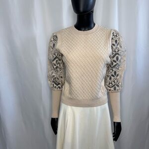 Elegant Cream Sweater with Lace Sleeves